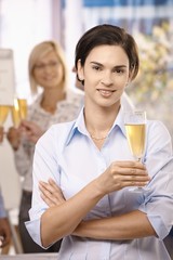 Portrait of businesswoman celebrating