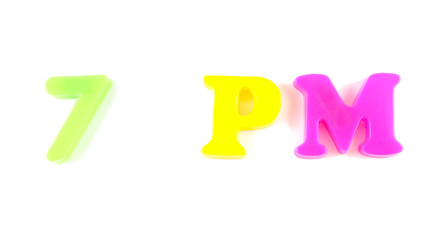 7 pm written in fridge magnets