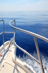 Fototapeta na wymiar boat sailing blue calm ocean sea bow railing