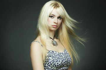 Naklejka premium Fashion portrait of the young blonde woman