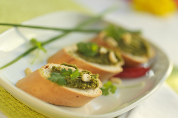 Green curry paste on baguette