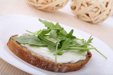 sandwich with cottage cheese on bread with rucola
