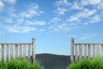 wooden fence with blue sky
