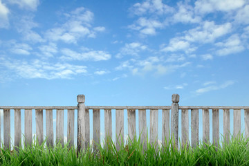 wooden fence with blue sky