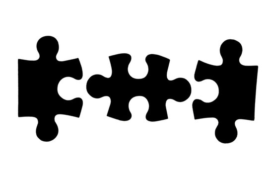 three different black puzzle pieces