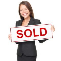 Realtor / Real estate agent woman sold sign on white background