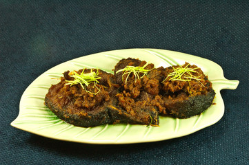 Santed eat fish with chilli paste