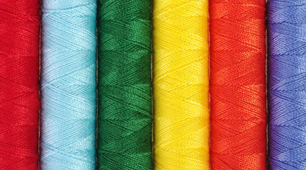 Closeup of different colored sewing thread