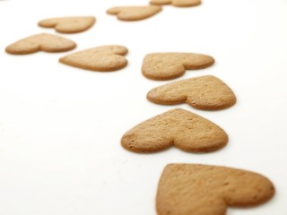 Fototapeta na wymiar Heart shaped gingerbread, white background