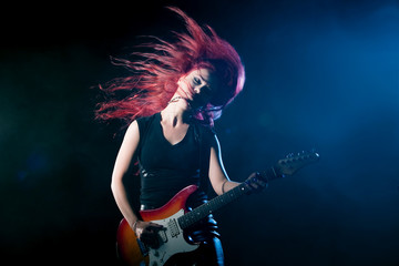 red-haired girl the guitarist
