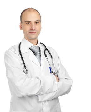 Smiling Confident Doctor Standing With Hands Crossed