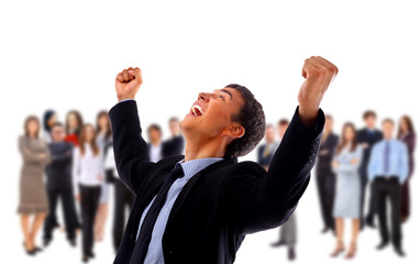 very happy energetic businessman with his arms raised