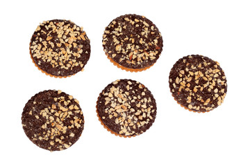Chocolate biscuits sprinkled with nuts