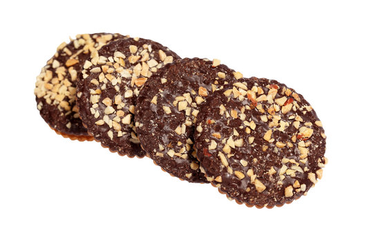 Chocolate biscuits sprinkled with nuts
