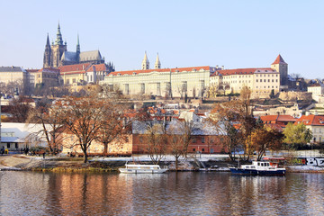 First Snow in Prague, gothic Castle above the River Vltava