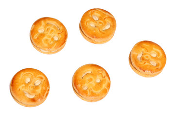 Smiling stuffed biscuit isolated on white background