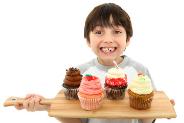 Boy with Cupcakes and Icing