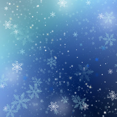 Fototapeta na wymiar Blue christmas/winter background with snowflakes