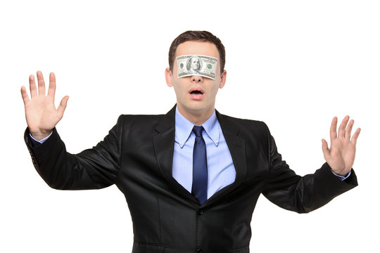 Confused blindfold businessman with a 100 dollar banknote