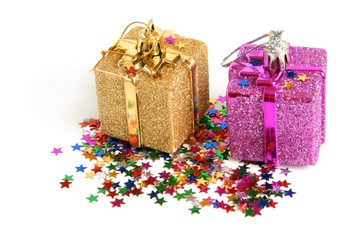 Two christmas toys with confetti