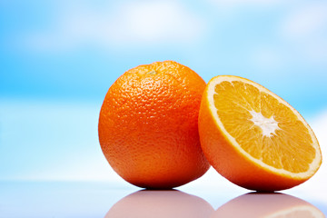 orange fruits on blue