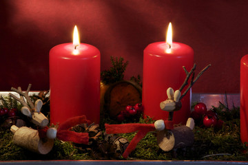 zwei hirsche und zwei kerzen