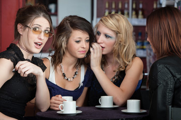 Girls sharing a Secret