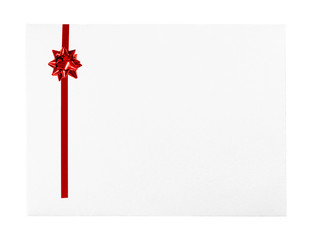 White greeting card envelope with red bow and room for text