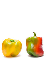 Two peppers isolated on white