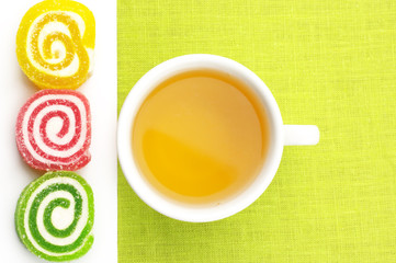 Colorful candy and tea