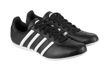 Black sneakers with white strips