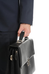 Image of a businessman holding a briefcase