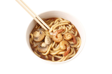 Eating Japanese udon noodles with chopsticks