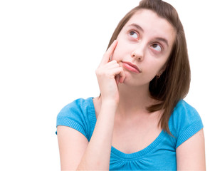 Fototapeta premium Девушка удивленно смотрит вверх.