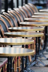 Fotobehang Row of chairs and tables © styf