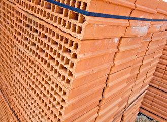 Obraz na płótnie Canvas orange brick building construction wall material