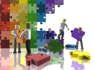 A team collaborating to build a rainbow flag