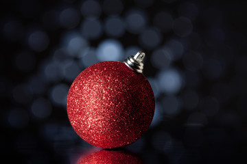 christmas balls on a holiday lights background