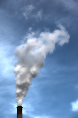 Smoke coming out a chimney