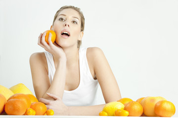 Obraz premium portrait of young woman with citrus fruit
