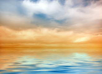 clouds hanging over the sea