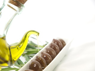 Fresh olives and olive oil