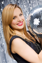 Naklejka premium Sexy woman dancing on silver background
