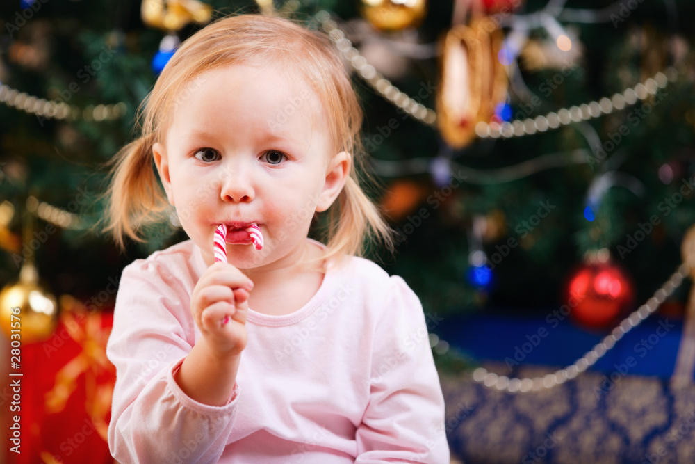 Sticker Toddler girl with Christmas candy