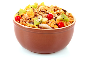Muesli in bowl isolated on white