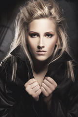 Fototapeta na wymiar Beautiful fashion woman portrait in leather jacket
