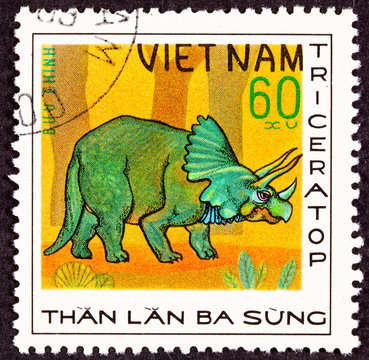 Vietnamese Stamp Green Triceratops Dinosaur in Profile Forrest