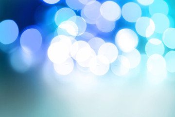 Blue and white light glow blurs abstract background