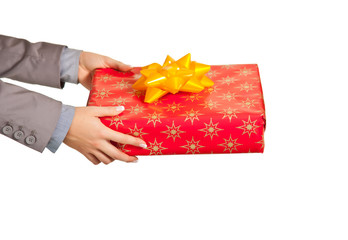 Woman hand with christmas present isolated on white