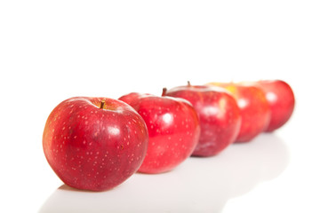 Fresh red juicy natural apples on white isolated background